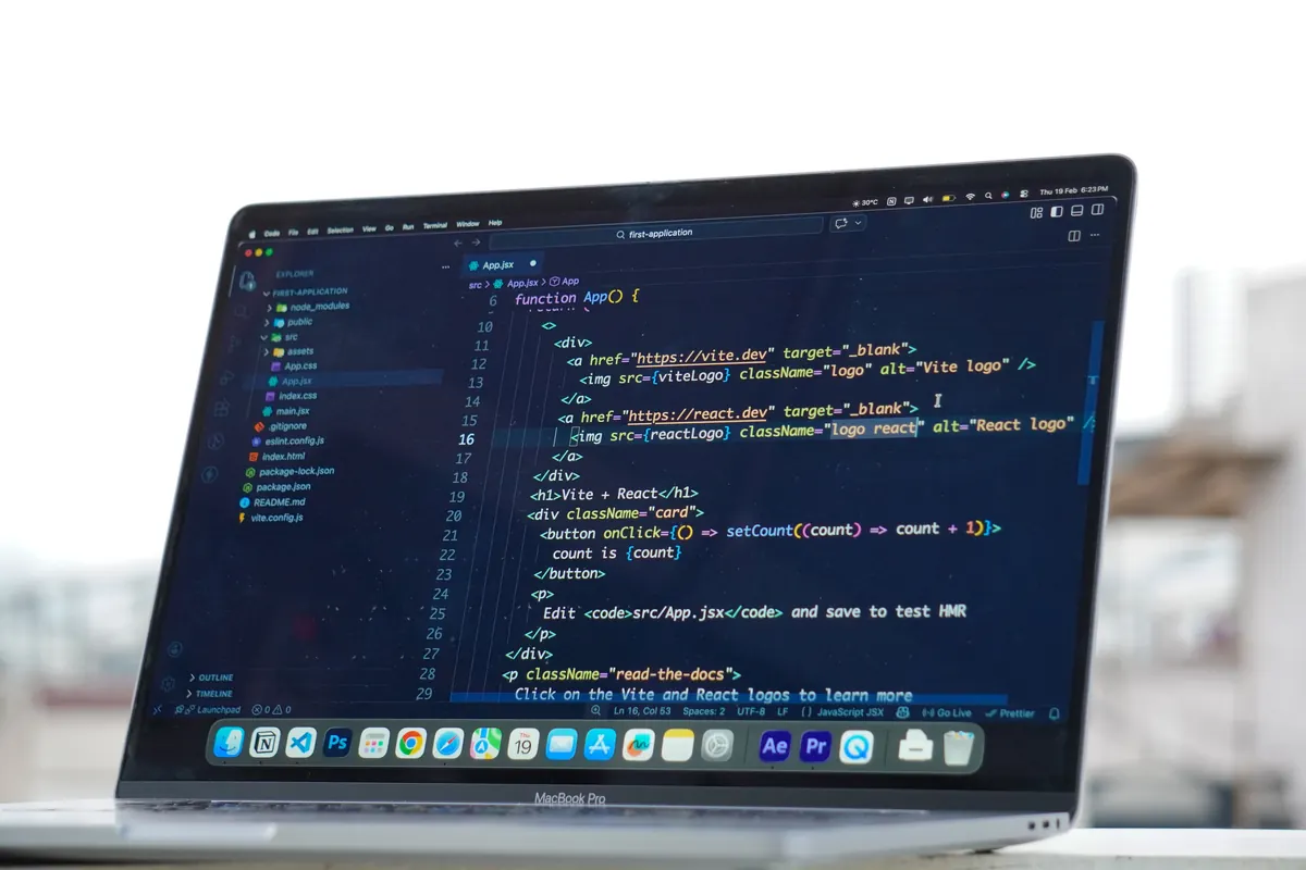 Web development workspace with dual monitors
